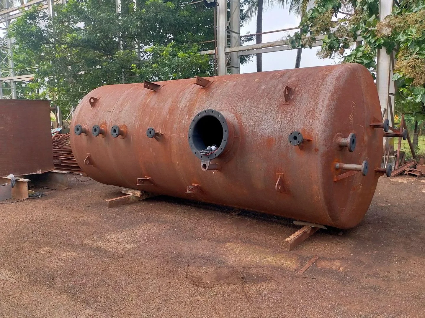 Large chemical storage tanks prepared for rubber lining